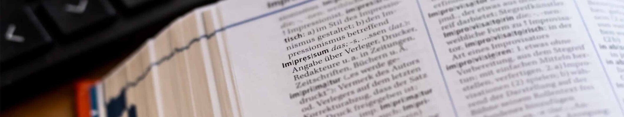Ein Wörterbuch der den Begriff Impressum zeigt